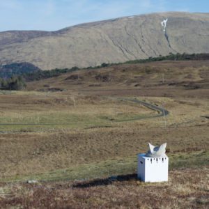 our pillow on a prop in a typical was open space Scottish landscape