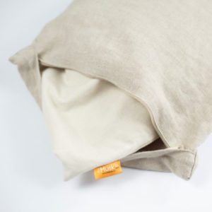 unzipped linen pillow case showing the cotton case inside